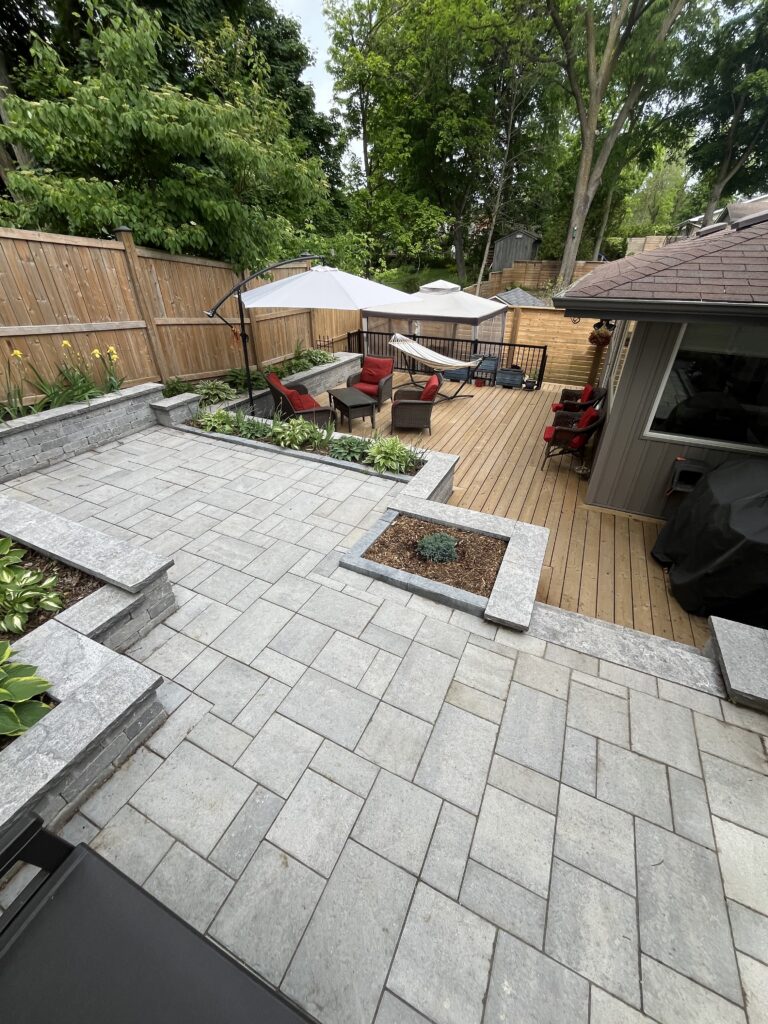 Spacious natural flagstone patio providing an elegant outdoor living and entertaining area