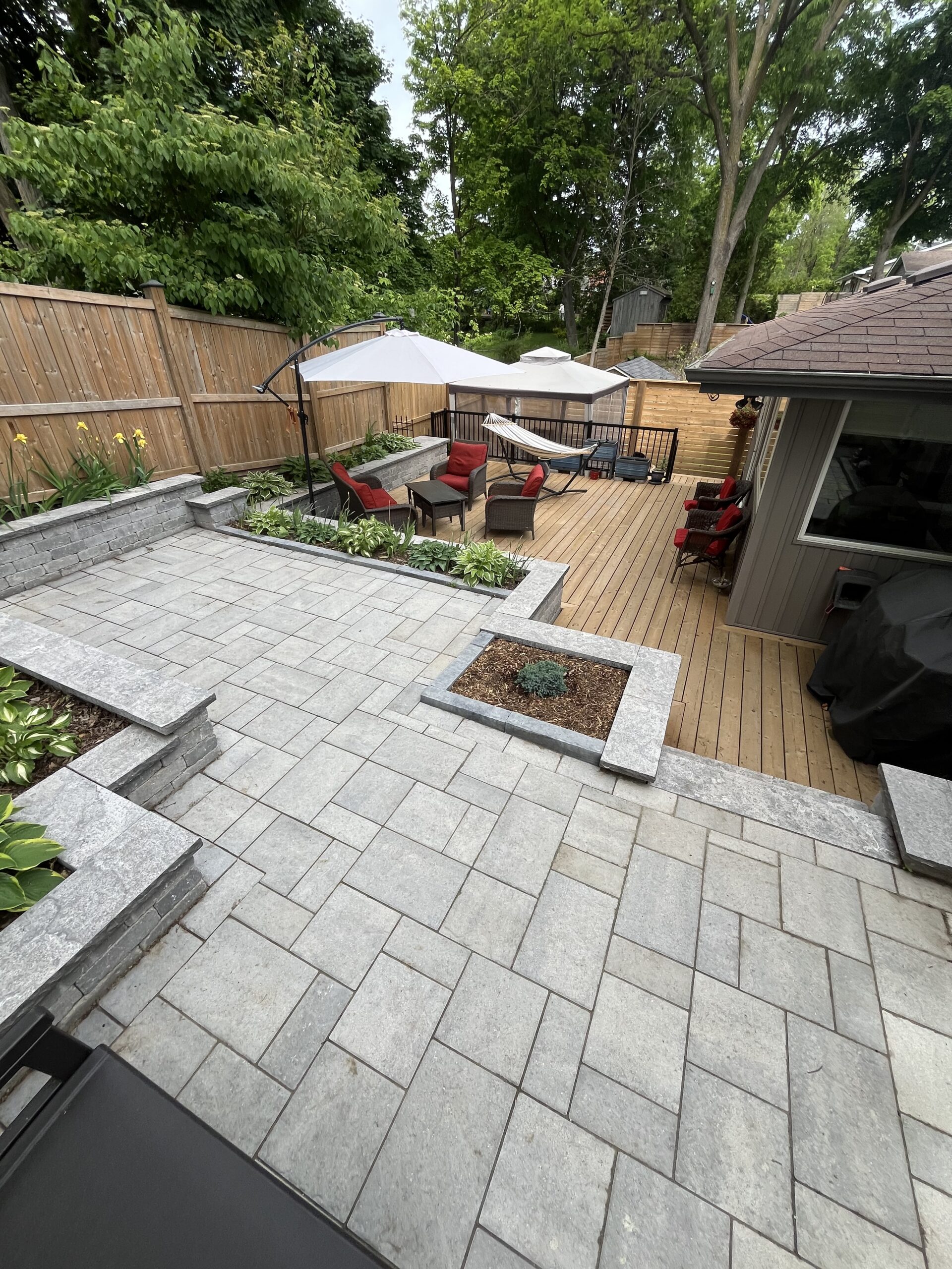 Spacious natural flagstone patio providing an elegant outdoor living and entertaining area